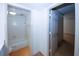 This bathroom includes a view into the tiled tub/shower area at 1150 Collier Rd # K3, Atlanta, GA 30318