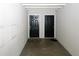 A pair of black doors with mats provide a secure entrance into the units at 1150 Collier Rd # K3, Atlanta, GA 30318