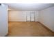 A living room provides access to a room with a sliding glass door at 1150 Collier Rd # K3, Atlanta, GA 30318