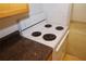 A white electric stove sits next to a countertop in this kitchen at 1150 Collier Rd # K3, Atlanta, GA 30318