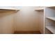 A walk-in closet provides generous storage space with shelving at 1150 Collier Rd # K3, Atlanta, GA 30318
