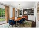 Elegant dining room featuring built-in shelving and a modern light fixture at 261 Lamplighter Se Ln, Marietta, GA 30067