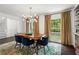Dining room with natural light, a modern light fixture, and comfortable seating at 261 Lamplighter Se Ln, Marietta, GA 30067