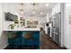 Modern kitchen with stainless steel appliances, an eat-in bar, and stylish pendant lighting at 261 Lamplighter Se Ln, Marietta, GA 30067
