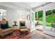 Cozy seating area with french doors leading to outdoor patio at 261 Lamplighter Se Ln, Marietta, GA 30067