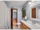 Bathroom with light blue walls, tile floors, and view into bedroom at 3754 Wyntuck Nw Cir, Kennesaw, GA 30152