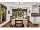 Charming dining room featuring a large window, chandelier, and seating for intimate meals at 3754 Wyntuck Nw Cir, Kennesaw, GA 30152