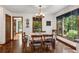 Warm and inviting dining room area with views into the kitchen, and seating for Gathering meals at 3754 Wyntuck Nw Cir, Kennesaw, GA 30152