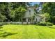 Charming home with large front yard and a white picket fence at 3754 Wyntuck Nw Cir, Kennesaw, GA 30152
