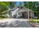 Home with a convenient carport and back entrance accessible by stairs at 3754 Wyntuck Nw Cir, Kennesaw, GA 30152