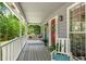 Inviting covered front porch with comfortable seating and classic design at 3754 Wyntuck Nw Cir, Kennesaw, GA 30152