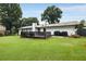 Large backyard with spacious deck and seating, perfect for enjoying the outdoors at 3844 Sw Saddle Ridge Dr, Snellville, GA 30039