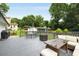 Spacious deck with outdoor seating and dining area, perfect for relaxing and entertaining at 3844 Sw Saddle Ridge Dr, Snellville, GA 30039