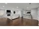 Cozy living room featuring a fireplace, comfortable seating, and elegant decor at 3844 Sw Saddle Ridge Dr, Snellville, GA 30039