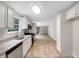 Updated kitchen featuring stainless steel appliances, white cabinets, and granite countertops for a modern design at 5159 Round Table Dr, Ellenwood, GA 30294