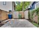 Enclosed backyard area with two storage sheds, providing extra storage space and privacy at 658 Mcgruder Ne St, Atlanta, GA 30312