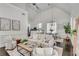 Spacious open living area featuring elegant decor, high ceilings, and seamless flow to the kitchen at 658 Mcgruder Ne St, Atlanta, GA 30312
