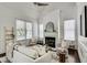 Comfortable living room features a fireplace, neutral furniture, and plenty of natural light at 658 Mcgruder Ne St, Atlanta, GA 30312