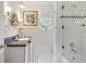 Elegant bathroom features a stylish vanity, modern fixtures, and a glass enclosed shower at 15 Northwood Ne Ave, Atlanta, GA 30309
