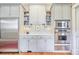 Modern kitchen with stainless steel appliances, custom cabinets, built-in microwave, and hardwood floors at 15 Northwood Ne Ave, Atlanta, GA 30309