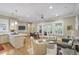 Inviting living area with hardwood floors, and large windows showcasing the natural light and dining area at 15 Northwood Ne Ave, Atlanta, GA 30309