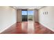 Bright living room with gleaming hardwood floors and balcony access at 1501 Clairmont Rd # 1522, Decatur, GA 30033