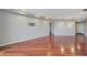 Spacious living room featuring hardwood floors, neutral paint, and modern recessed lighting at 1501 Clairmont Rd # 1522, Decatur, GA 30033