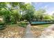 Community pool is fenced and landscaped at 1501 Clairmont Rd # 1522, Decatur, GA 30033