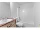 Bathroom features a tub and shower combo with an updated vanity at 165 Lost Lake Trl, Villa Rica, GA 30180