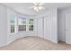 A well lit bedroom featuring carpet, natural light and a ceiling fan at 165 Lost Lake Trl, Villa Rica, GA 30180