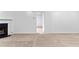 Spacious living room showcasing a fireplace and neutral, inviting decor at 165 Lost Lake Trl, Villa Rica, GA 30180