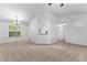 Bright living room with large window, neutral paint and plush carpet at 165 Lost Lake Trl, Villa Rica, GA 30180