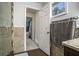 Bathroom with shower, granite topped vanity and decorative tile at 4271 Keheley Ne Rd, Marietta, GA 30066