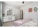 Cozy bedroom with ample sunlight, dresser with mirror and artwork on the wall at 4271 Keheley Ne Rd, Marietta, GA 30066