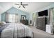 Spacious bedroom featuring vaulted ceilings, a ceiling fan and lots of natural light at 4271 Keheley Ne Rd, Marietta, GA 30066