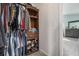 Walk-in closet featuring custom shelving and ample storage space with lots of clothing at 4271 Keheley Ne Rd, Marietta, GA 30066