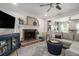 Inviting living room with fireplace, mounted television, and access to a playroom at 4271 Keheley Ne Rd, Marietta, GA 30066