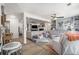 Open-concept living area featuring a fireplace, built-in shelving, and comfortable seating at 4271 Keheley Ne Rd, Marietta, GA 30066
