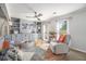 Bright living room with built-in cabinets, a comfortable recliner, and plenty of space for play at 4271 Keheley Ne Rd, Marietta, GA 30066
