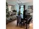 Dining room with modern chandelier, plants, and ample decor at 120 Alfred Dr, Carrollton, GA 30116