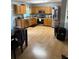 Well-lit kitchen featuring stainless steel appliances, light wood cabinets and ample countertop space at 120 Alfred Dr, Carrollton, GA 30116