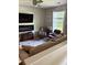Inviting living room with modern fireplace, TV, and cozy seating at 120 Alfred Dr, Carrollton, GA 30116