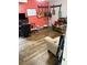 Music room with guitars on wall, comfortable seating, and wood flooring at 120 Alfred Dr, Carrollton, GA 30116