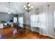 Open-concept with bright windows, hardwood floors, and view to office area at 168 Gatlin Ridge Run, Dallas, GA 30157