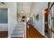 Welcoming foyer with hardwood floors and a staircase leading to the upper level at 168 Gatlin Ridge Run, Dallas, GA 30157