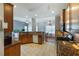 Spacious kitchen with granite countertops and wooden cabinets at 168 Gatlin Ridge Run, Dallas, GA 30157