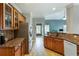 Bright kitchen with tile floors, granite counters, and stainless steel appliances at 168 Gatlin Ridge Run, Dallas, GA 30157