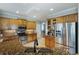 Open kitchen featuring stainless steel appliances, granite countertops, and tile backsplash at 168 Gatlin Ridge Run, Dallas, GA 30157