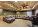 Living room showcases a sectional sofa, wood burning stove, and wooden ceilings at 168 Gatlin Ridge Run, Dallas, GA 30157