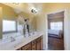 Bright main bathroom with double vanity sinks, soaking tub, and neutral colors at 168 Gatlin Ridge Run, Dallas, GA 30157